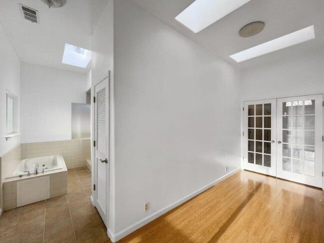 Building Photo - Spacious 4-Bedroom Home with Stunning Hill...