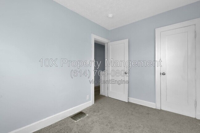Building Photo - 1311 E 24th Ave