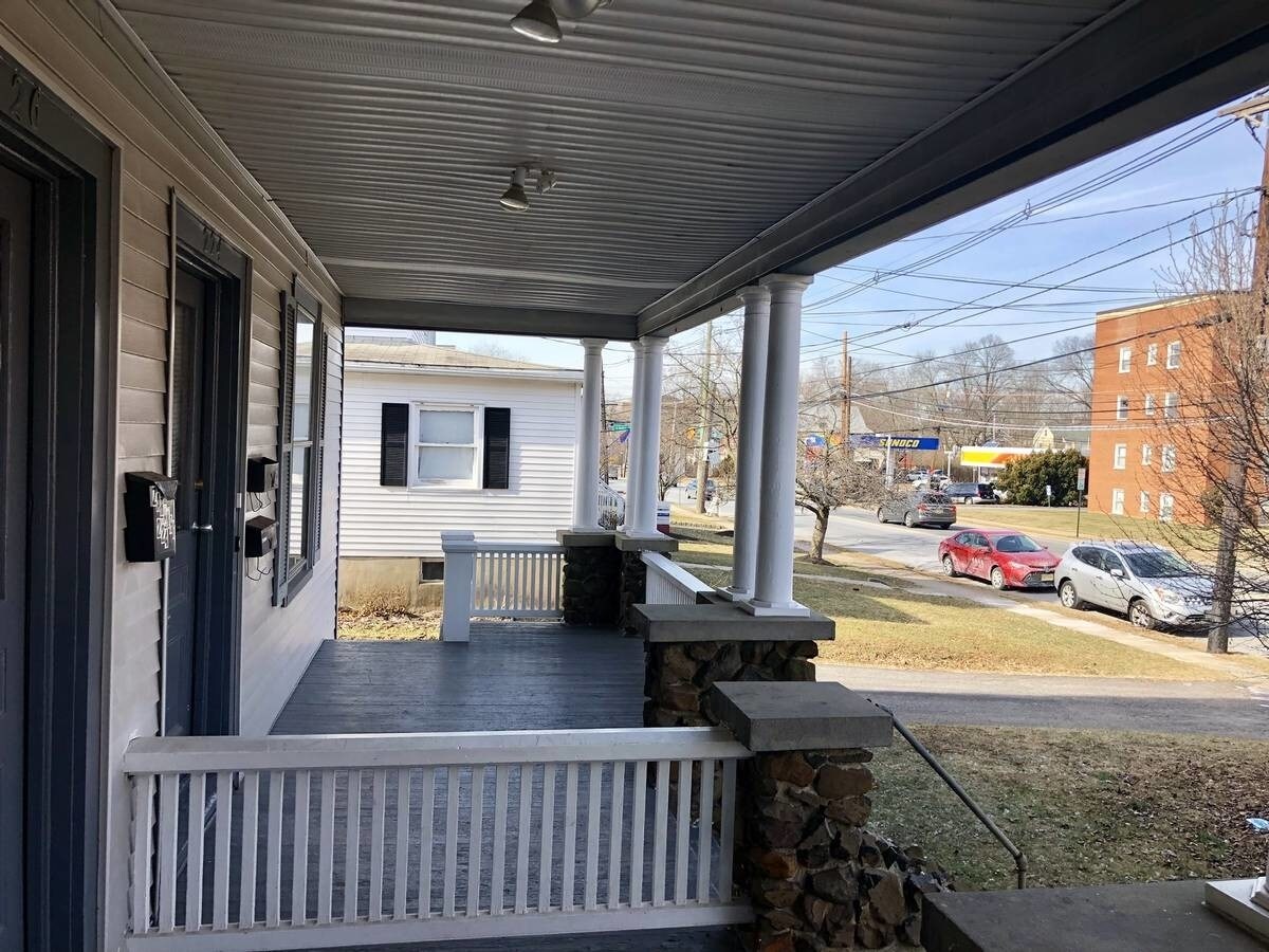 Covered front porch perfect for sunny days - 224 E Main St