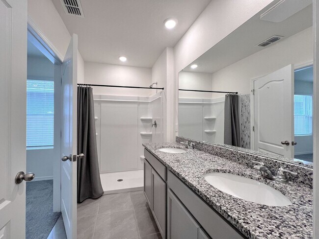 Building Photo - Four-Bedroom Home with Modern Finishes & Open Layout