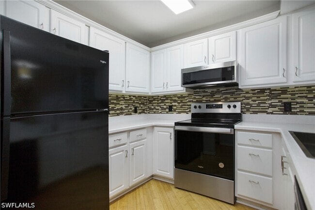 Building Photo - 8271 Key Royal Cir