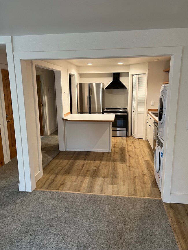 Kitchen with washer/dryer and pantry - 2707 E 27th Ave