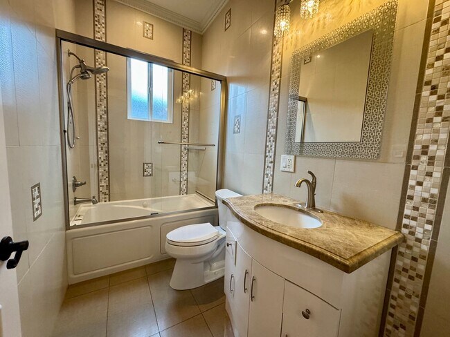 Building Photo - Peaceful North Hollywood street, charming three-bedroom, three-bathroom residence