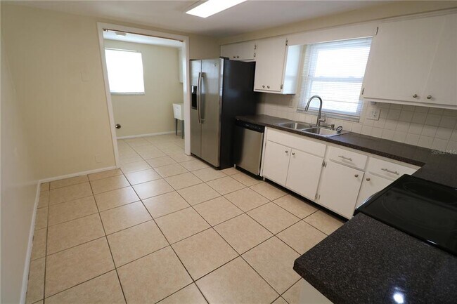 Building Photo - 7825 Birchwood Dr