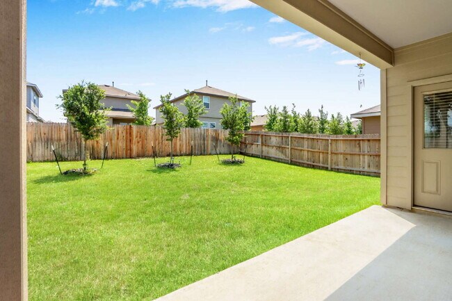 Building Photo - "Charming 4-Bedroom Retreat with Spacious ...