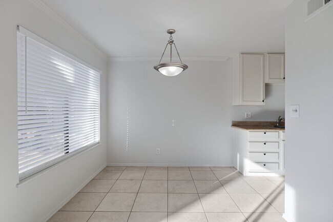 Building Photo - Welcome to Sunrise located in the Heart of...