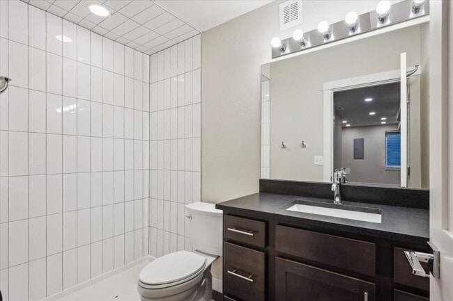 Building Photo - Modern 4-Bedroom Townhome with Rooftop Deck Near Sloan’s Lake & Light Rail