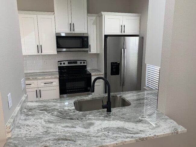 Building Photo - 7437 Mead Dr