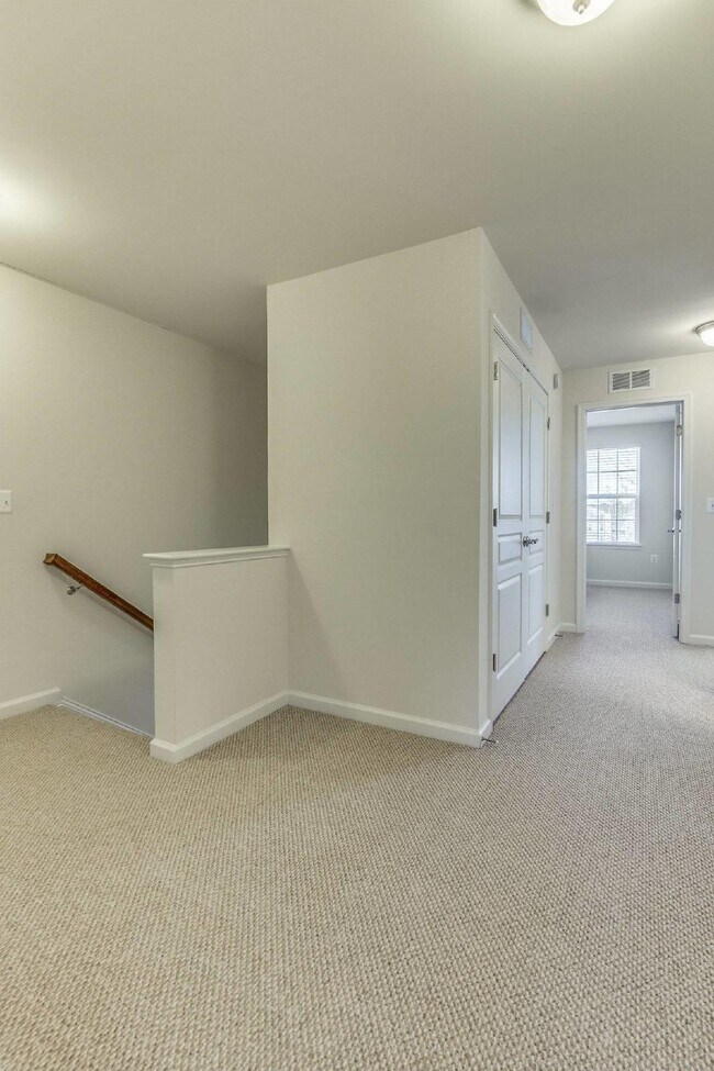 Building Photo - 3-bedroom, 2.5-bathroom condo with a great open-concept main level.