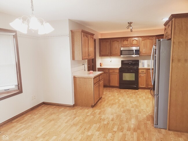 Building Photo - 5025 W Edwards Ave