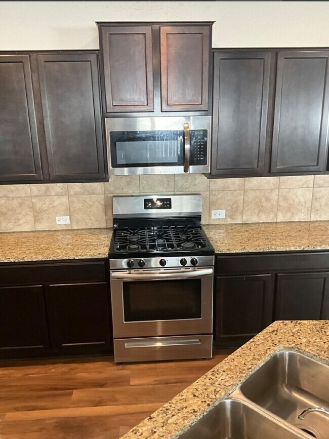 Building Photo - "Charming 4-Bedroom Home with Granite Elegance in San Antonio!"