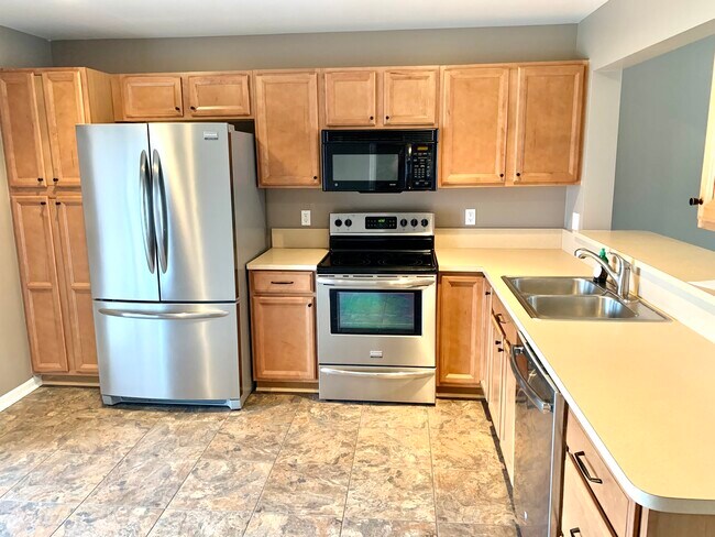 Kitchen with stainless steal appliances - 51870 Adler Park Dr E