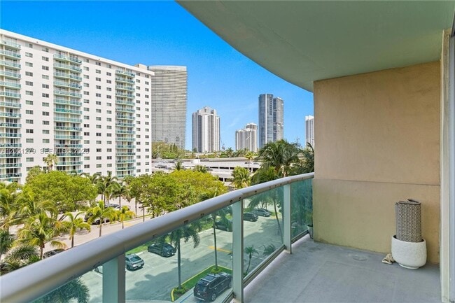 Building Photo - 19390 Collins Ave