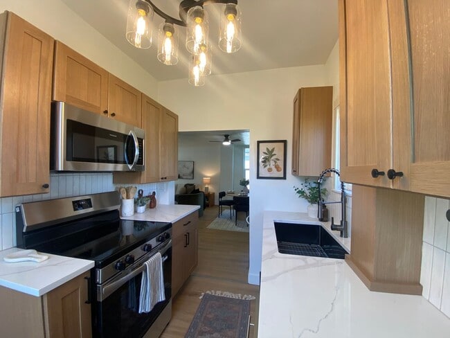 Building Photo - Totally remodeled 3-bedroom, 2-bath available now near Spokane Community College with large shop