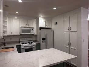 Building Photo - Imagine coming home to this hidden spaciou...