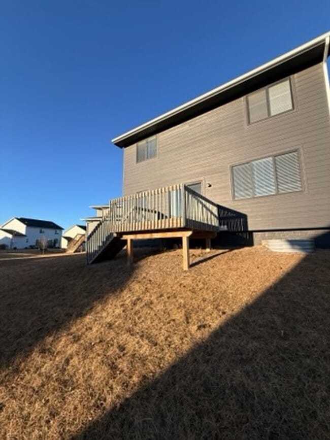 Building Photo - Spacious 4-Bedroom Home with 2-Car Garage & Yard