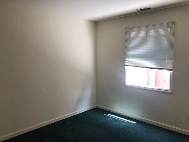 Building Photo - COMING SOON-Spacious 4 bedroom with 3 full bathrooms. Well maintained, private 4-plex with large ...