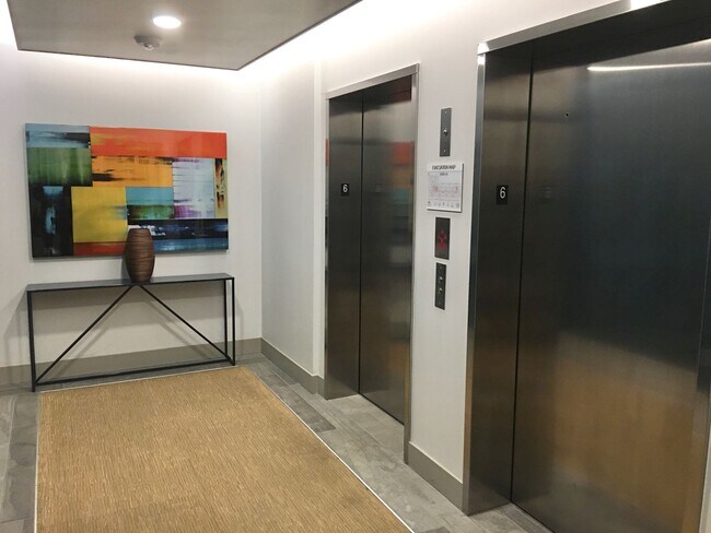 Building Photo - Urban Living at the Vik - Top Floor Condo