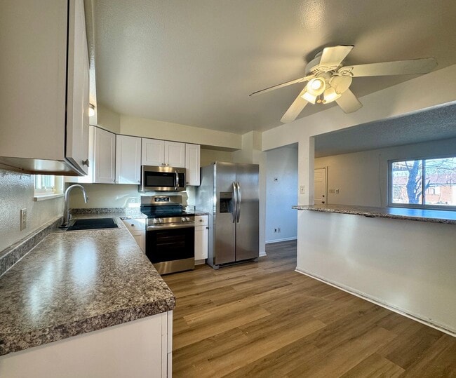 Building Photo - Spacious 5-Bedroom Single-Family Home with Fenced Yard & Garage