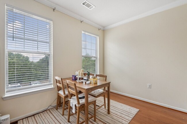Building Photo - Stylish 3-Level Condo with Garage in Prime...