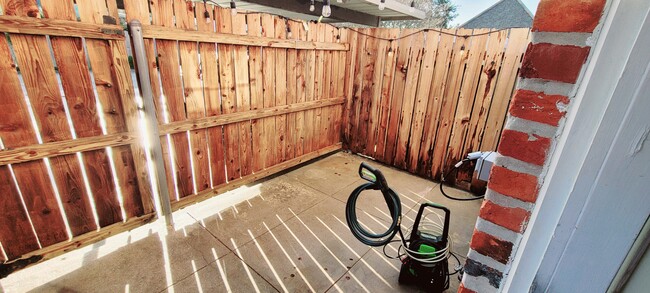 Back Private Patio With Gate To 2-Car Covered Parking - 416 Doucet Rd