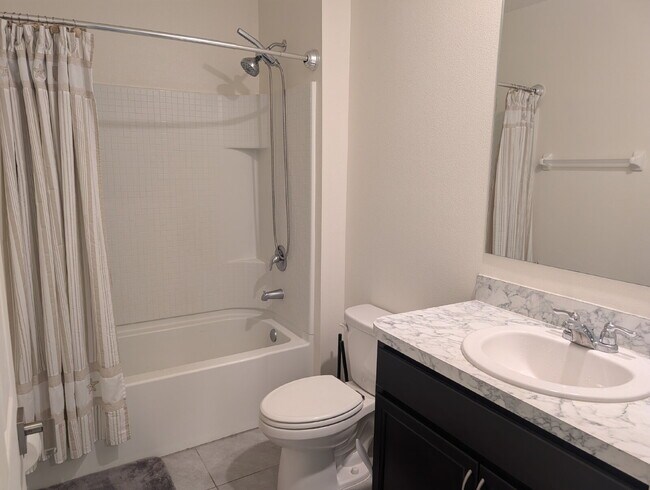 Building Photo - Modern 4-Bedroom Home with Large Backyard in Quiet SW Palm Bay – Available Mid-June