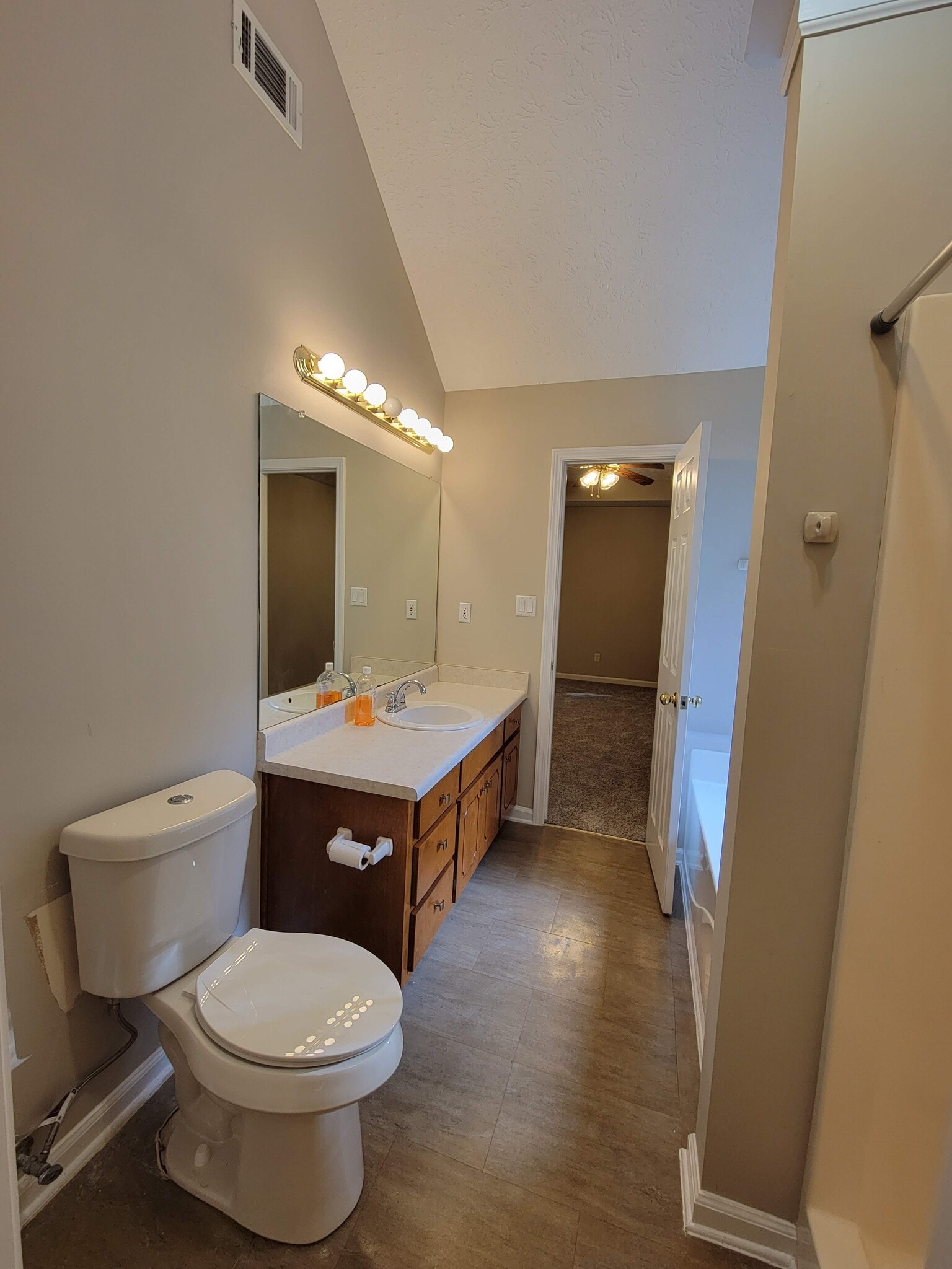 Primary bathroom and closet - 119 Bay Court Dr