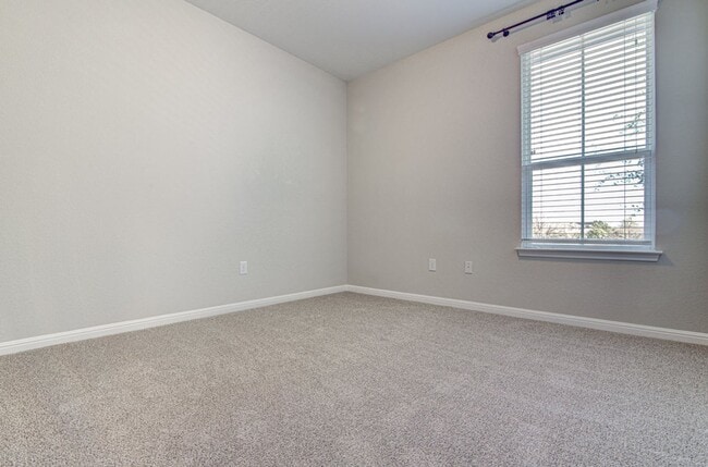 Building Photo - Cute as a Button 3/2.5 home in Parmer Village Townhomes, move-in ready!
