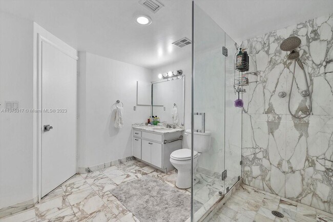 Building Photo - 10155 Collins Ave