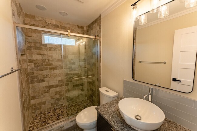Building Photo - Modern Elegance in Vibrant East Austin: Chic Duplex with Stylish Upgrades, Private Oasis, Prime L...
