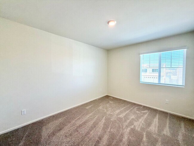 Building Photo - Modern 4 Bedroom 3 Bathroom Living with INCLUDED Solar & Entertainer’s Backyard