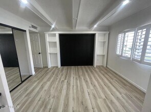 Building Photo - 7870 E Camelback Rd