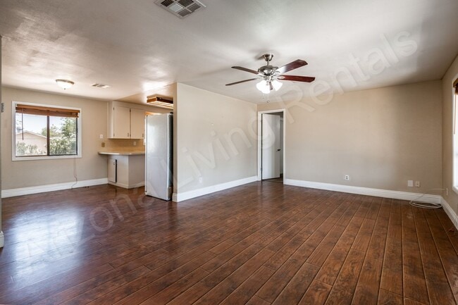 Building Photo - LARGE FENCED YARD WITH DETACHED GARAGE