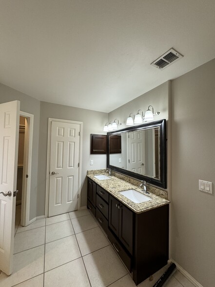 Double vanity with granite finishes - 10212 N 12th St