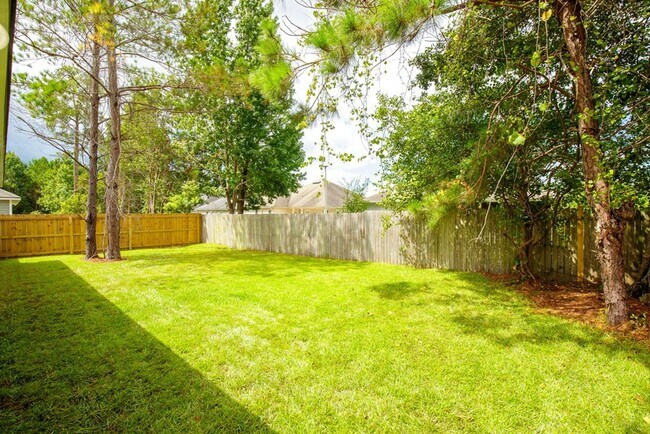 Building Photo - Contemporary 4BR/2BA Home with 2-Car Garage, Spacious Yard, and Close Proximity to Moody Air Forc...