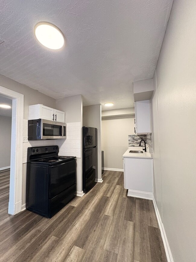 Building Photo - Live in Style without Breaking the Bank at Magnolias Living Apartments Washer & dryer in-unit