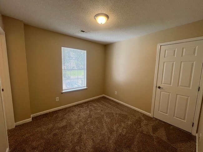 Building Photo - Welcome to Timbertop5127, a well-appointed 4-bedroom, 2.5-bath home in Charlotte, NC.