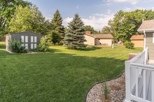 Building Photo - LARGE AND SPACIOUS, YET COZY AND QUAINT RANCH STYLE 4 BD, 3 BA HOUSE WITH DOUBLE ATTACHED GARAGE,...