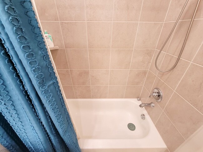 Building Photo - A true gem on a quiet corner lot, this spa...