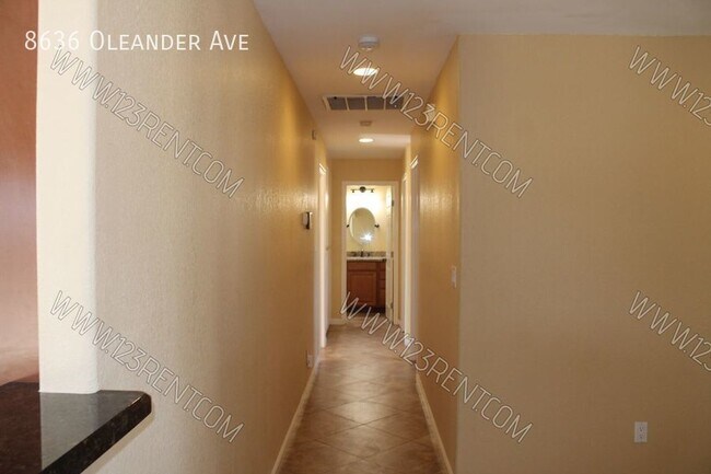 Building Photo - 8636 Oleander Ave