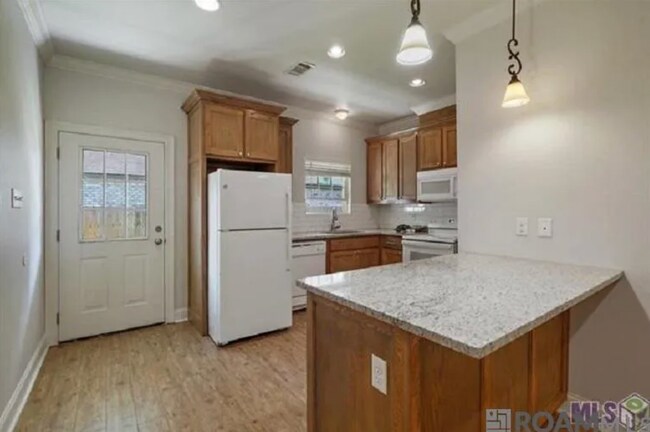 Building Photo - Greenwell Springs 4-plex