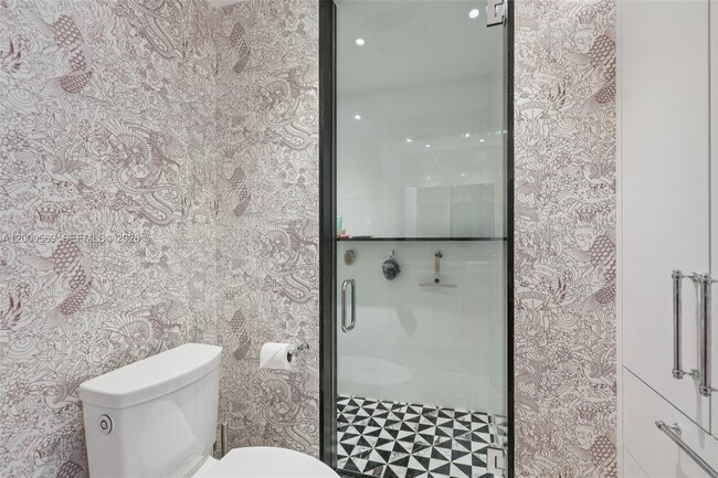 Building Photo - 10275 Collins Ave