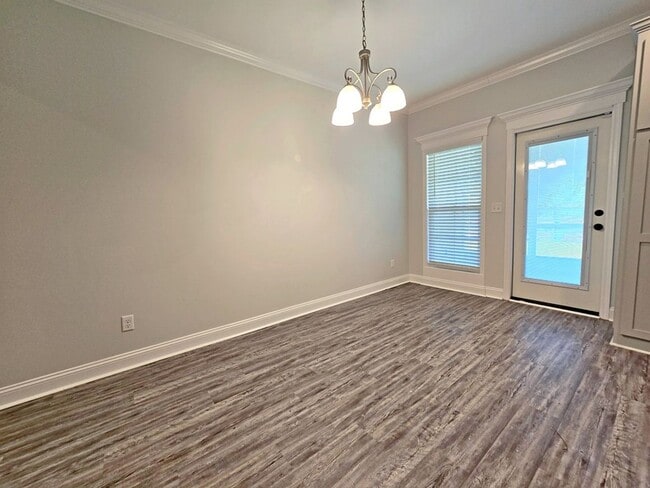 Building Photo - Stylish 4-Bedroom Home with Screened Porch...