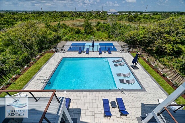 Building Photo - OFF-SEASON MONTHLY RENTAL - IT'S A BIG DILL!!