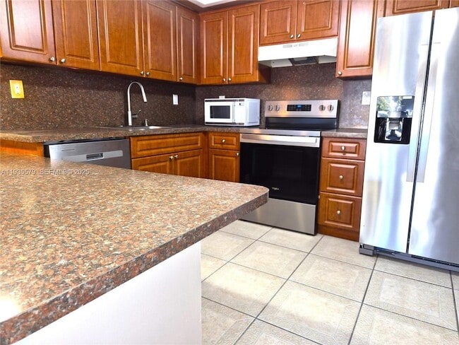 Building Photo - 8811 SW 132nd Pl