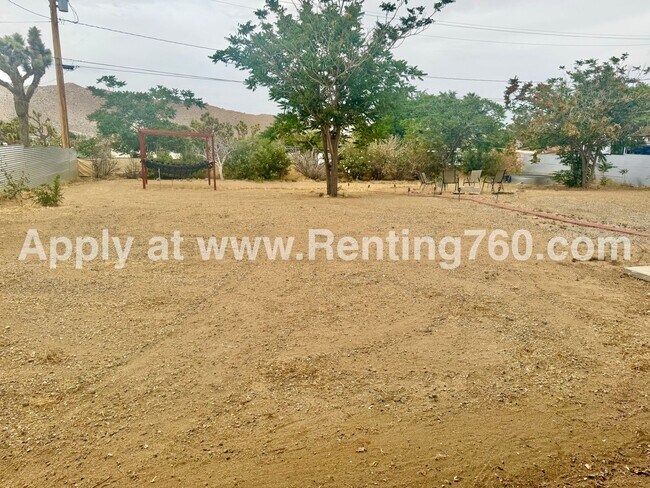 Building Photo - Stylish 3-Bedroom Home with Fenced Yard, Spa & Modern Upgrades – Prime Yucca Valley Location