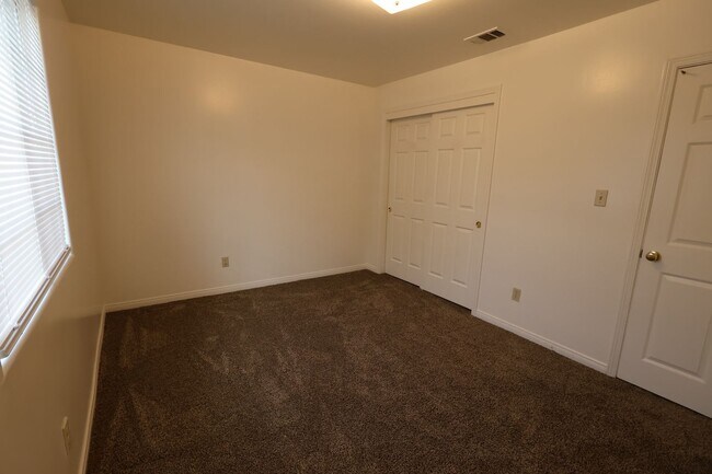 Building Photo - Spacious 3 Bedroom Duplex with Private Patio –Available! Ask About Our Move-In Special!