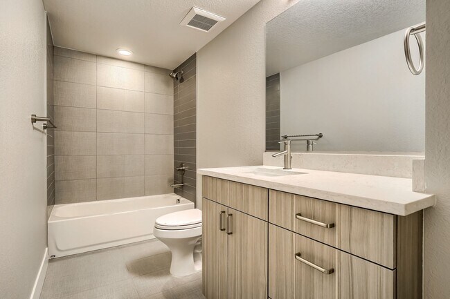 Building Photo - 3 bedroom / 3.5 bath Townhome + 2 Large Flex Spaces & Spacious Roof Top Deck!