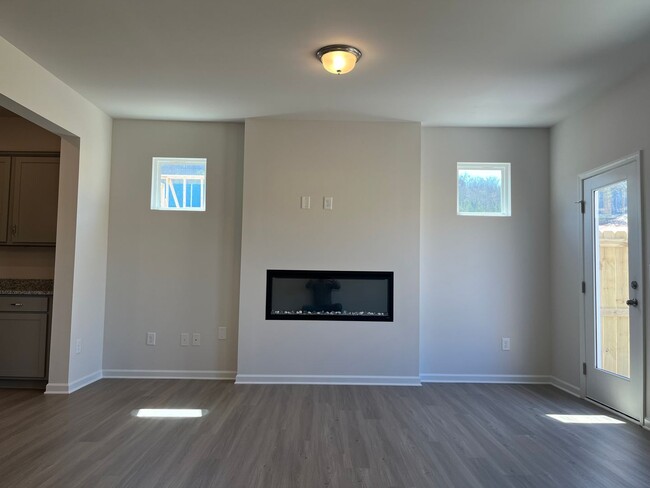 Building Photo - Beautiful Newly Constructed 3/.25 Townhome!