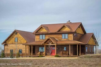 Building Photo - Stunning Seasonal Rental on 5.18 Acres – B...